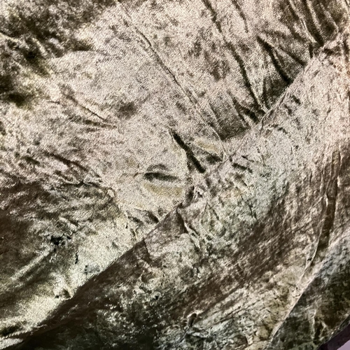 A forest green velvet bedspread having bands of gilt embroidery to the