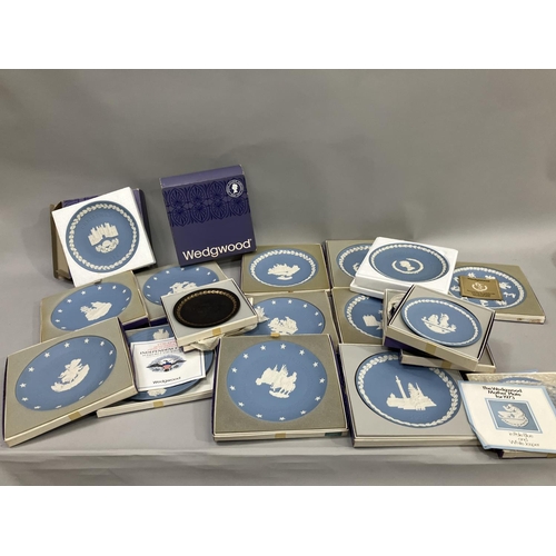 106 - A collection of Wedgwood Jasperware, mainly in blue, and including American Independence, Christmas,... 