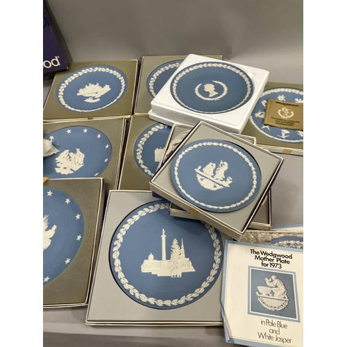 106 - A collection of Wedgwood Jasperware, mainly in blue, and including American Independence, Christmas,... 