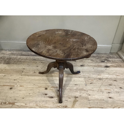 480 - A 19th Century oak circular tripod table, the column has been reduced, 60cm diameter