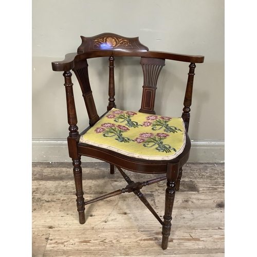 509 - An Edwardian mahogany and satinwood inlaid corner chair with pierced splats and needlework seat, wor... 