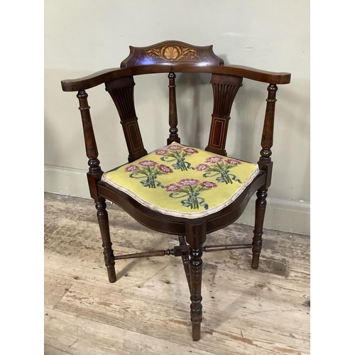 509 - An Edwardian mahogany and satinwood inlaid corner chair with pierced splats and needlework seat, wor... 