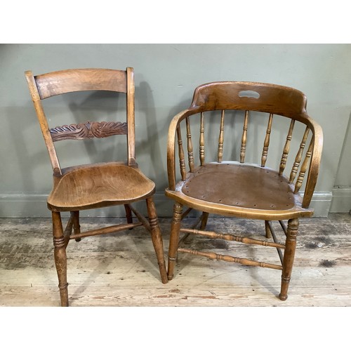 119 - A beech 1920's office chair with rail back and an elm chair  with carved back and turned legs