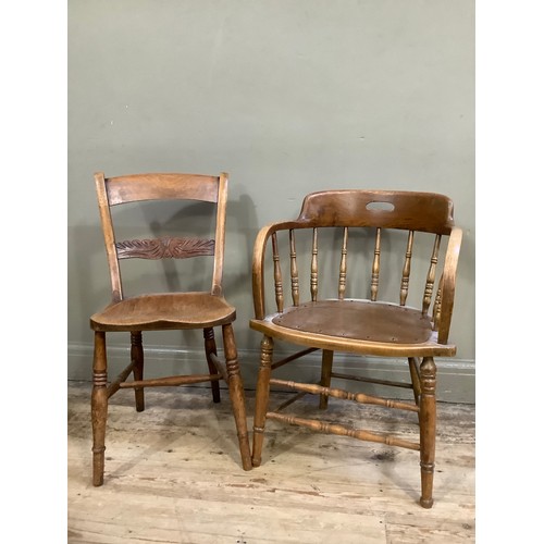 119 - A beech 1920's office chair with rail back and an elm chair  with carved back and turned legs