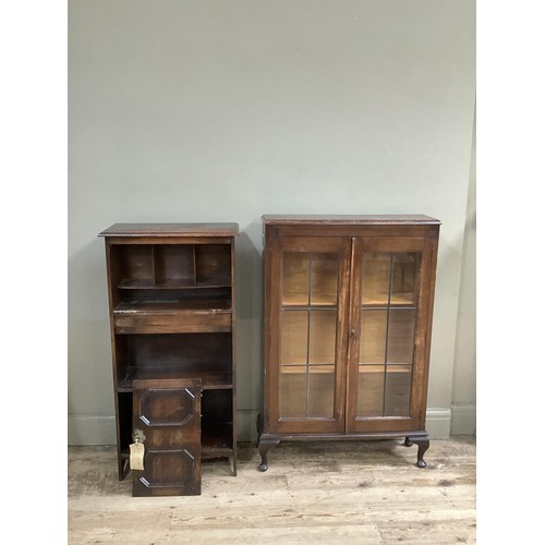 484 - A 1940's oak two door bookcase with leaded glazed doors on cabriole legs together with a fall front ... 