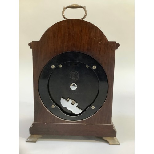 17 - A mahogany cased mantle clock, Tempus Fugit by Ogdens of Harrogate, brass dial with spoundrels, Roma... 