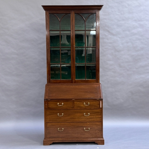 302 - A reproduction mahogany bureau bookcase originally fitted as a gun cabinet, now with painted green s... 