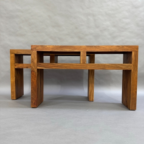 342 - A pair of open fronted Marks and Spencers hard wood console tables, 125cm wide, 76cm high, 31cm deep