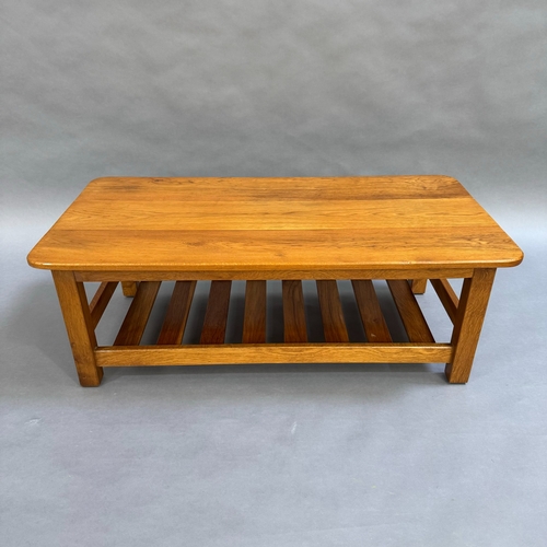 343 - A modern beech coffee table with under tier, 107cm wide, 55cm deep