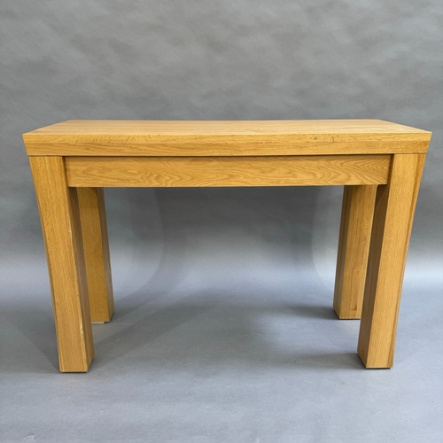 344 - A modern light oak, rectangular side table on square framing, 110cm wide, 77cm high, 40cm deep