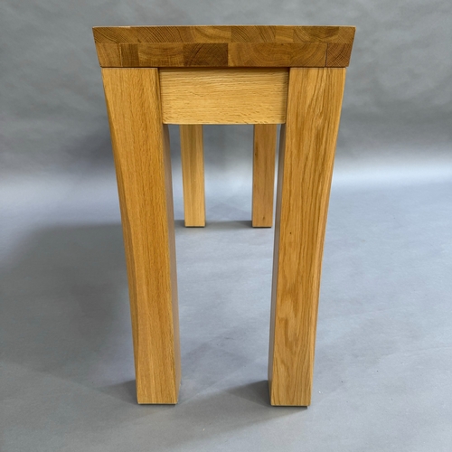 344 - A modern light oak, rectangular side table on square framing, 110cm wide, 77cm high, 40cm deep