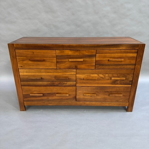 340 - A modern 'Maddison' seven drawer chest with walnut finish, three short drawers over two sets of  two... 