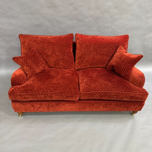 355 - A two seater sofa, Duresta, upholstered in russet fabric with feather back cushions, 180cm wide, 107... 