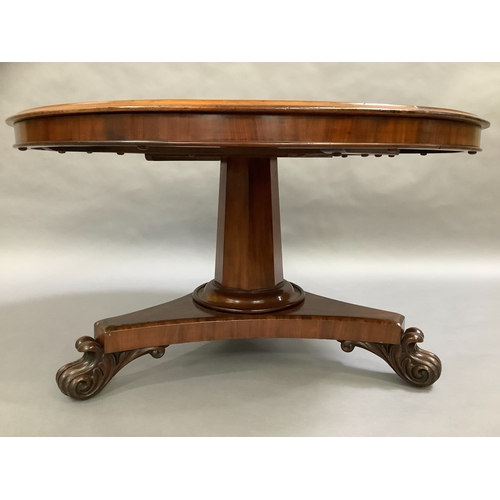 317 - An Early Victorian Figured Mahogany centre table, the top with moulded lip above a shallow frieze, o... 