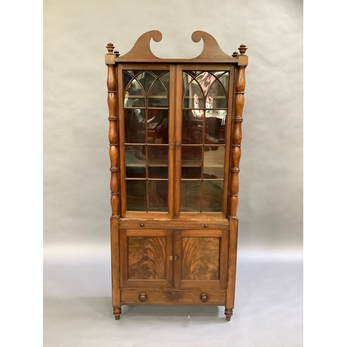 307 - A mahogany reproduction glazed bookcase above two door cupboard, single slide and single drawer, tur... 