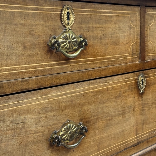 328 - A Victorian mahogany cupboard with satinwood inlay,, two short drawers above one long drawer, the lo... 