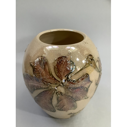 11 - A Moorcroft Horse Chestnut Leaf and Conker pattern ovoid vase, tubelined and enamelled under a lustr... 