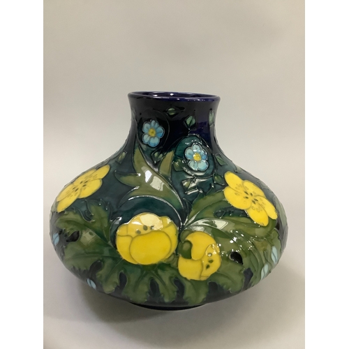 3 - A Moorcroft Buttercup pattern vase, of compressed spherical shape, tubelined and enamelled in shades... 