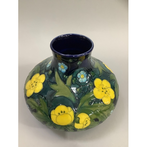 3 - A Moorcroft Buttercup pattern vase, of compressed spherical shape, tubelined and enamelled in shades... 