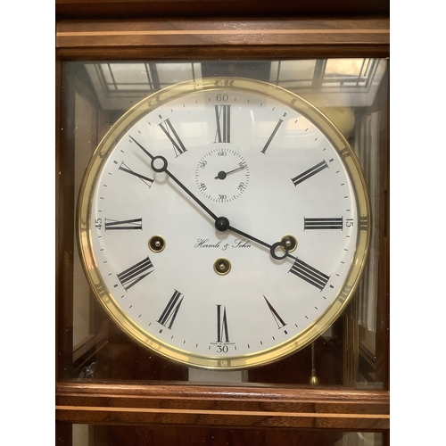 48 - A Hermle Westminster chime mahogany cased Vienna wall clock, with weights (as new, in original packa... 