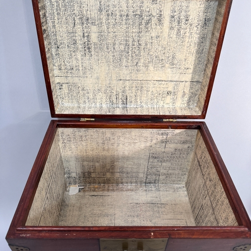 329 - A Chinese mahogany and brass mounted box on stand, 43cm wide max x 33cm deep max x 65cm high