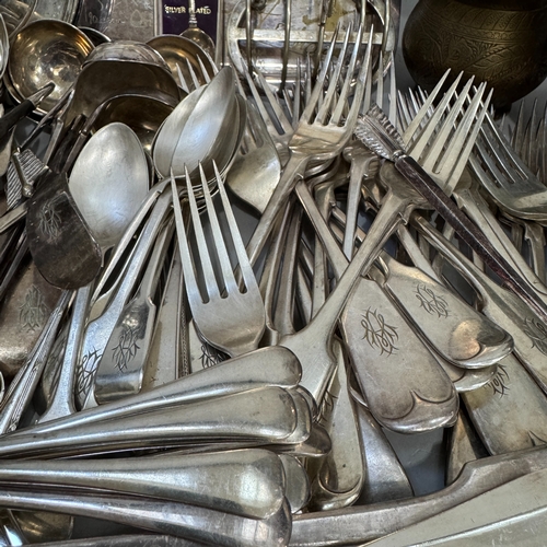 98 - A collection of 19th and early to mid 20th Century silver plate including cutlery, a three piece tea... 