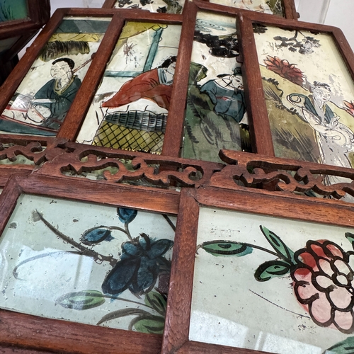 52 - Two 20th century Chinese hardwood lanterns with reverse painted glass panels, the largest 38cm diame... 