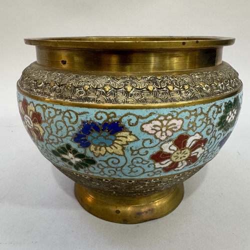 57 - An early 20th century Chinese cloisonné jardinière, circular with a band of flowerheads against a bl... 