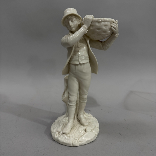 65 - A Royal Worcester white china figural spill vase of a country lad carrying a basket on his shoulder ... 