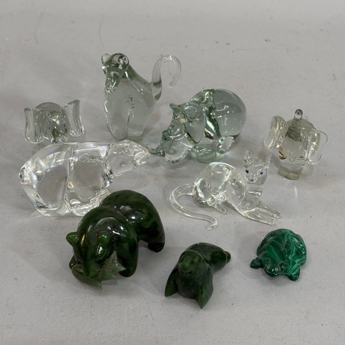 67 - A jade carving of a grizzly bear and salmon, another of a seal, a malachite frog and six glass anima... 