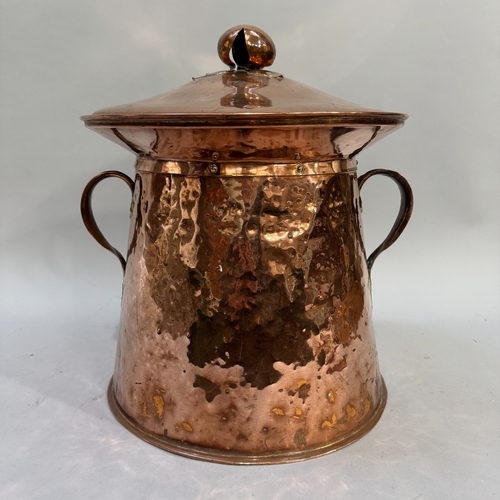 70 - Arts & Crafts copper two-handled coal vase, the domed cover having a bud finial and a pair of strap ... 