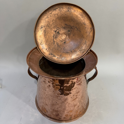 70 - Arts & Crafts copper two-handled coal vase, the domed cover having a bud finial and a pair of strap ... 