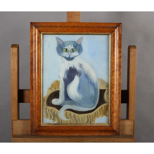 78 - Anon, 20th century, a grey and white cat with green eyes, sitting upon a brown tasselled cushion, re... 