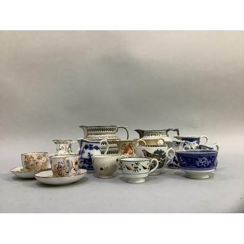 82 - Early 19th century silver lustre and moulded jugs, later sprigged and underglaze blue painted and pr... 