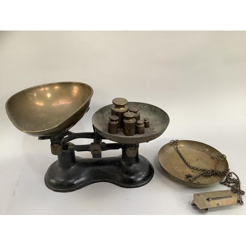 86 - A vintage set of weighing scales by Boots, Nottingham with brass pan and set of  brass weights, pock... 