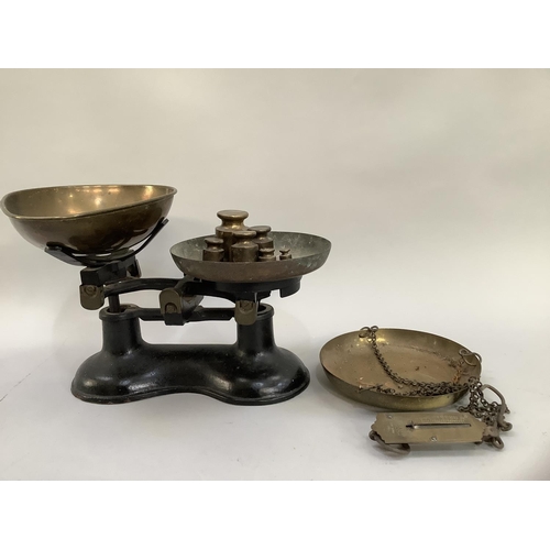 86 - A vintage set of weighing scales by Boots, Nottingham with brass pan and set of  brass weights, pock... 