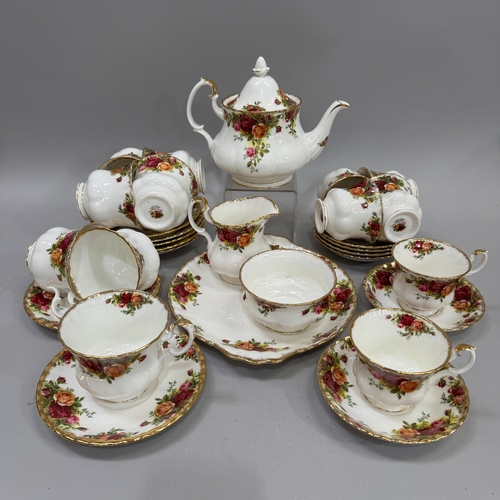 74 - An Royal Albert Old Country Roses tea service comprising teapot, sugar and cream, seven teacups and ... 