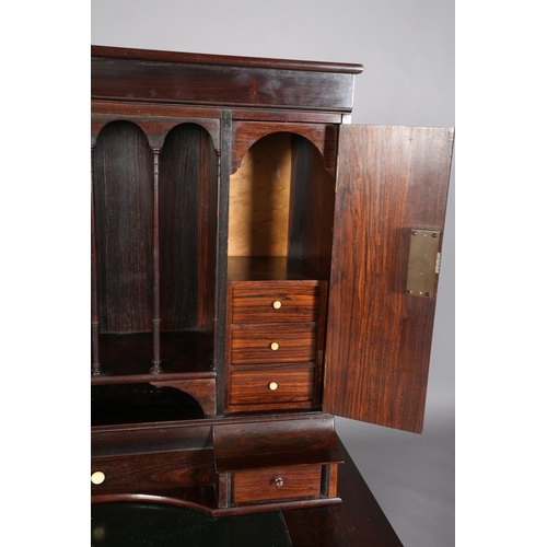 365 - A mid 19th Century rosewood secretaire having an open compartment with four slender turned spindles ... 