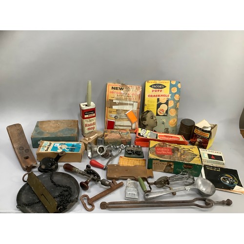 97 - A collection of vintage kitchenalia, some in original packaging including a pastry press, bean slice... 