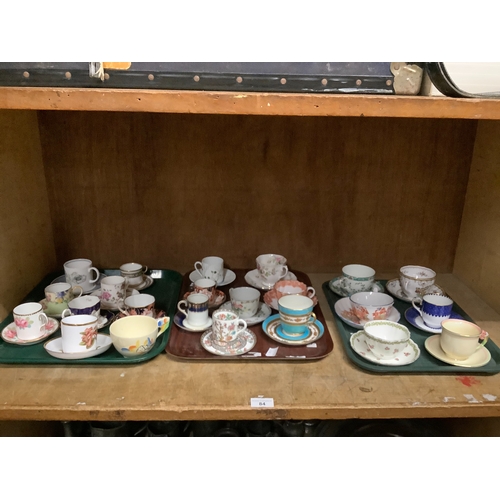 84 - A collection of coffee cups and saucers and teacups and saucers including Royal Crown Derby, Wedgwoo... 