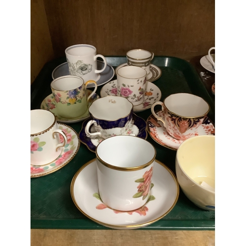 84 - A collection of coffee cups and saucers and teacups and saucers including Royal Crown Derby, Wedgwoo... 