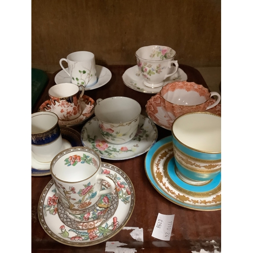 84 - A collection of coffee cups and saucers and teacups and saucers including Royal Crown Derby, Wedgwoo... 