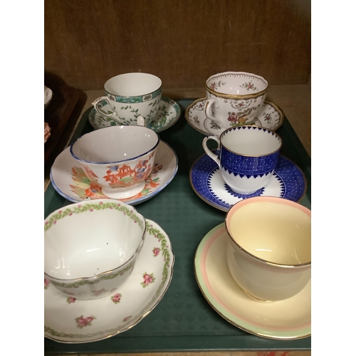 84 - A collection of coffee cups and saucers and teacups and saucers including Royal Crown Derby, Wedgwoo... 