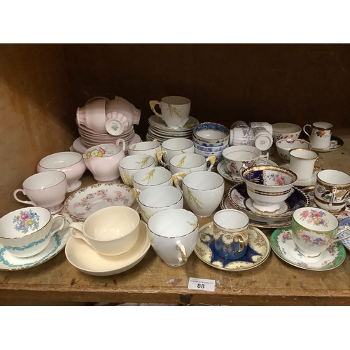 88 - An Aynsley part coffee service, another part coffee service together with further decorative teacups... 