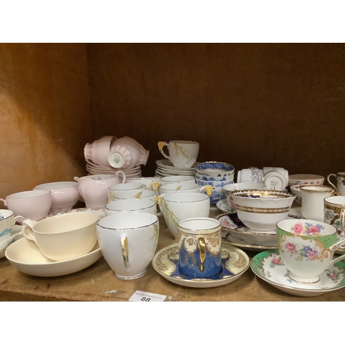 88 - An Aynsley part coffee service, another part coffee service together with further decorative teacups... 