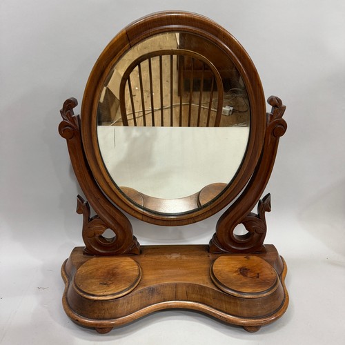 303 - Two Victorian toilet mirrors, one oval and one arched outline