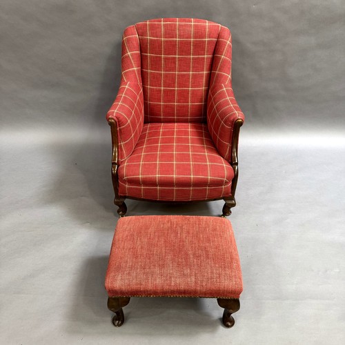 353 - An Edwardian armchair upholstered in cerise with cream check, on cabriole legs with brass castors, t... 