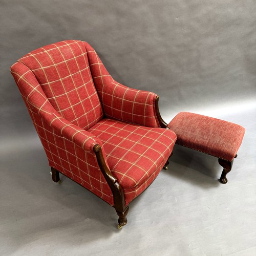 353 - An Edwardian armchair upholstered in cerise with cream check, on cabriole legs with brass castors, t... 