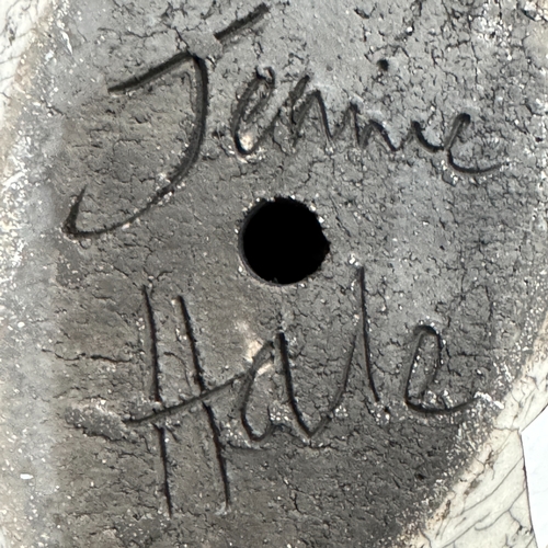 54 - Jennie Hale (20/21st Century), A studio raku pottery crested grebe, incised decoration and signed to... 