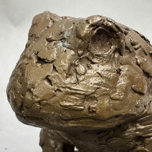 57 - A bronze sculpture of a toad, impressed monogram ES within a crown, to the underside, 19cm wide x 14... 